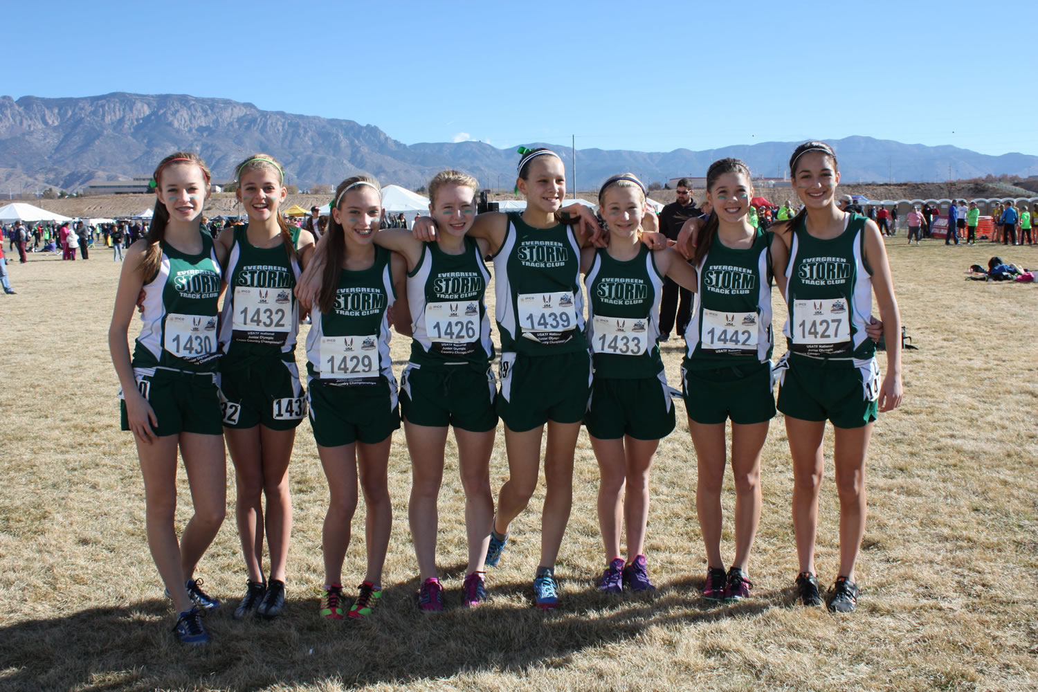 The Evergreen Storm Track Club's youth girls team pictured before the USATF Junior Olympic Cross Country National Championships.