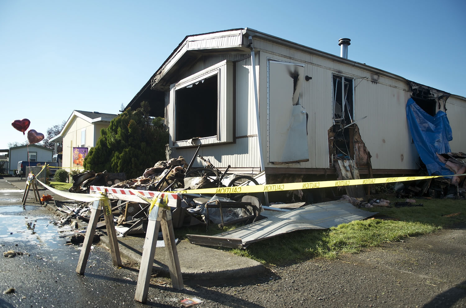 A 53 year-old woman died in a fatal house fire, seen here photographed Tuesday October 29, 2013 in Battle Ground, Washington.