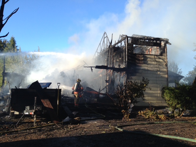 A two-alarm fire tore through a home in Felida on Friday.