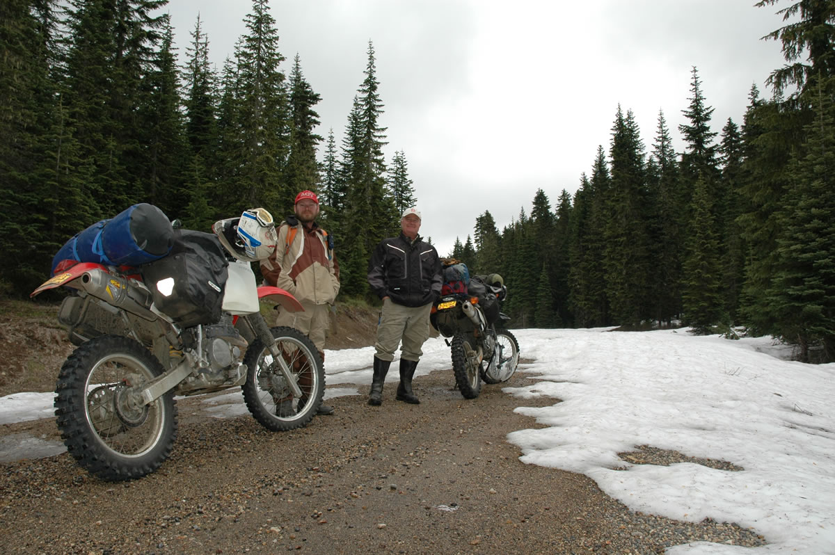Mike Newton, left, and Steve Pierson of Portland pose by their motorcycles on Gifford Pinchot National Forest road No.