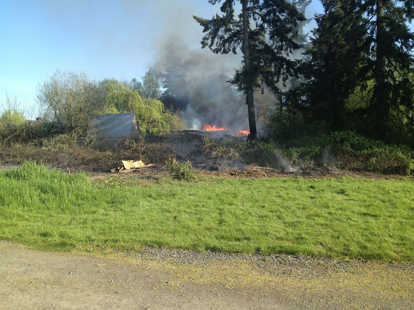 A wind-driven brush fire about 5:00 p.m.