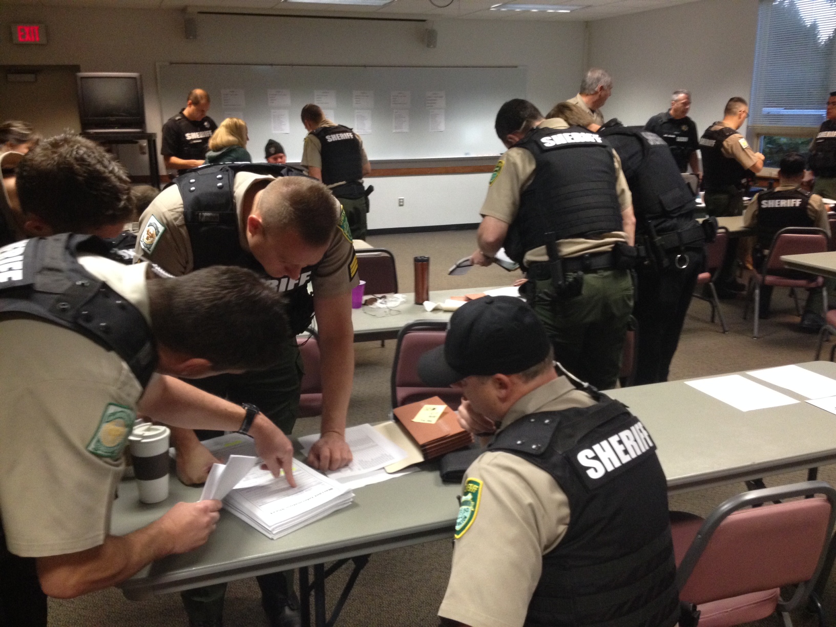 Clark County sheriff's deputies gear up this morning for a warrant sweep.