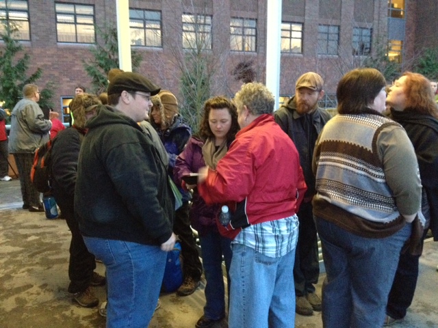 People line up outside the Clark County Public Service Center on Thursday, the first day gay couples can apply for a marriage license in Washington state.