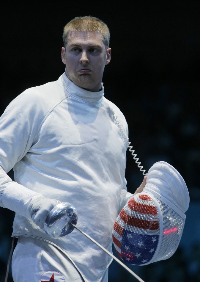 Vancouver native Seth Kelsey looks to the crowd after his match against Estonia's Nikolai during the men's individual epee fencing competition at the 2012 Summer Olympics Wednesday in London.