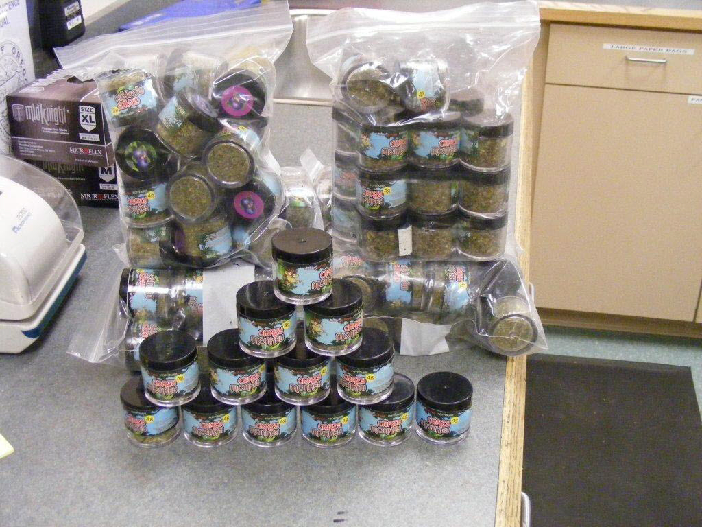 Containers of synthetic marijuana, or &quot;spice,&quot; are displayed after being seized by Yamhill County, Ore., police agencies in 2011.