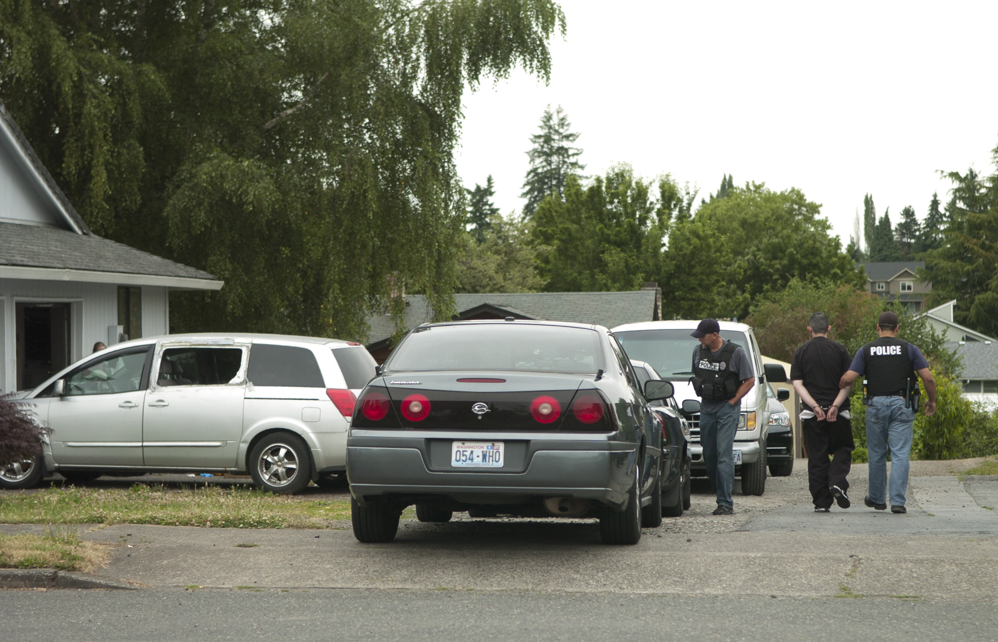 Sheriff's deputies and SWAT officers raided a central Vancouver house early Friday.