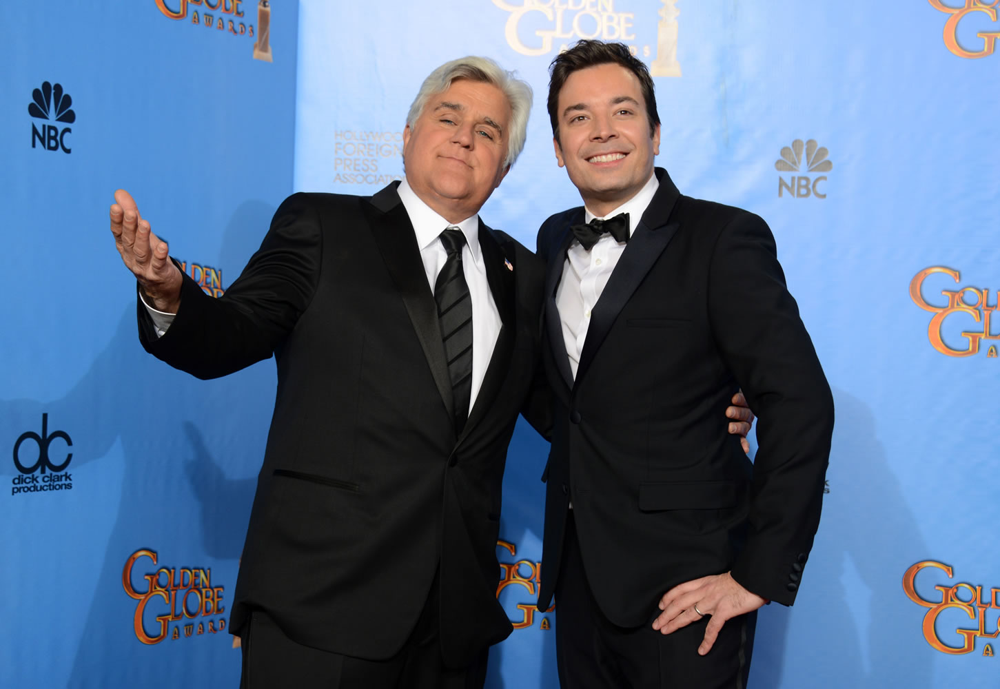 This Jan. 13, 2013 file photo shows Jay Leno, host of &quot;The Tonight Show with Jay Leno,&quot; left, and Jimmy Fallon, host of &quot;Late Night with Jimmy Fallon&quot; backstage at the 70th Annual Golden Globe Awards in Beverly Hills, Calif. Leno and Jimmy Fallon poked fun at the late-night rumors swirling around them in a music video that aired between their back-to-back NBC shows on Monday, April 1.