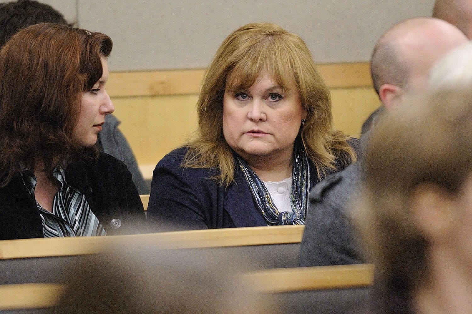 Sandra Weller, accused of locking up and starving her adopted twins, was arraigned Thursday.