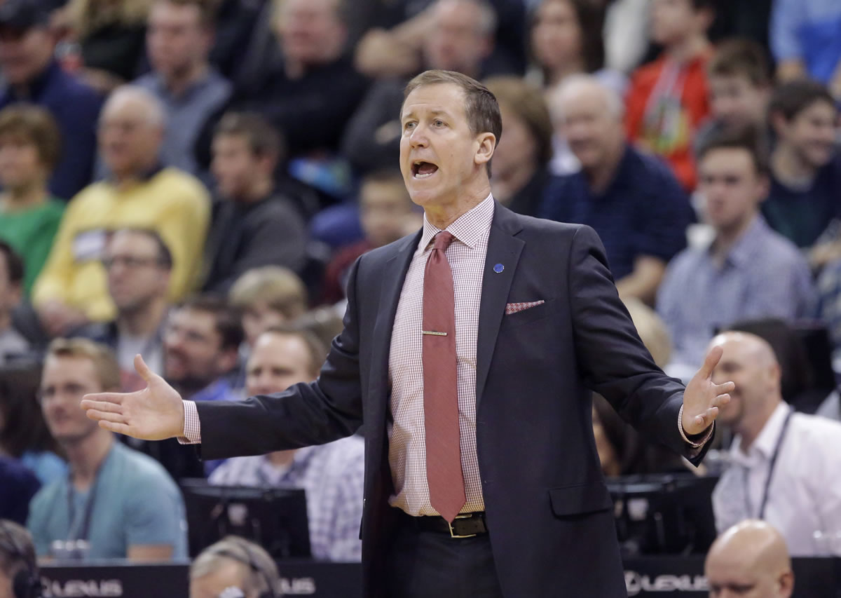 Portland Trail Blazers head coach Terry Stotts shouts to his team during the second quarter of an NBA basketball game against the Utah Jazz Thursday, Dec. 31, 2015, in Salt Lake City.