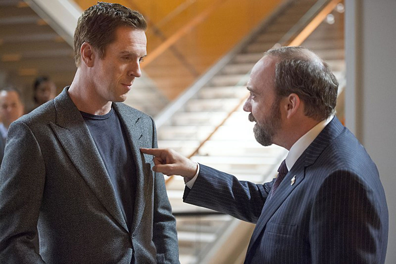 Damian Lewis, left, and Paul Giamatti star in &quot;Billions.&quot; (Showtime)