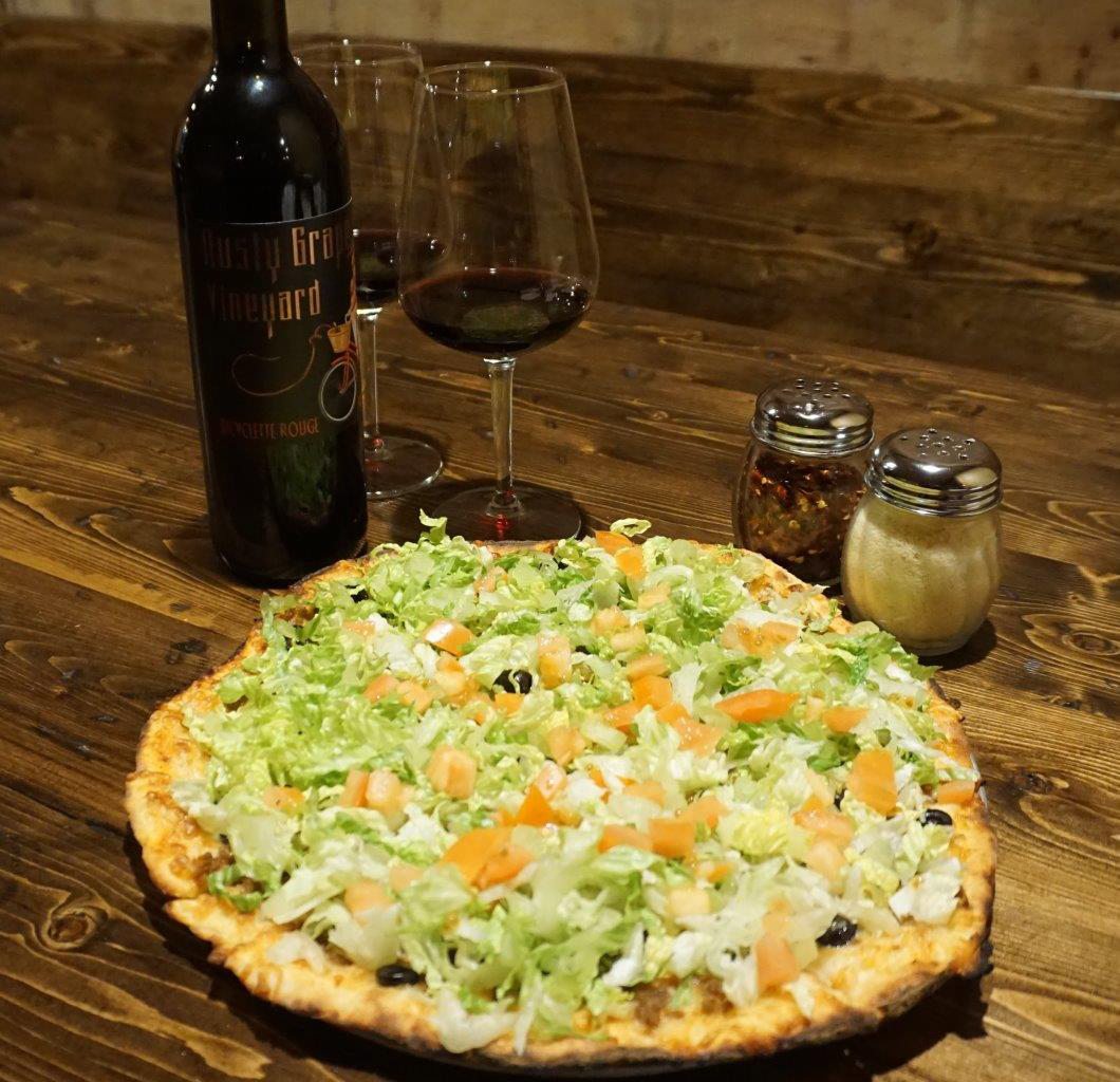 With expanded hours, Tuesdays bring Rusty Grape Vineyard&#039;s version of Taco Tuesday with a newly added taco pizza.