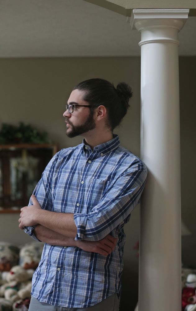 Josh Froats, 19, a sophomore chemical engineering major at Ohio State University, has his hair in a bun.