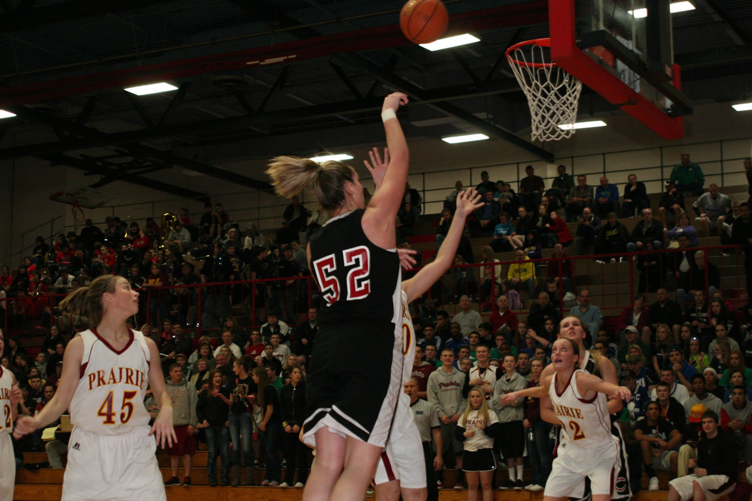 Jenka Stiasna puts the ball in the basket for Camas in the district championship game against Prairie Friday, at Fort Vancouver High School.