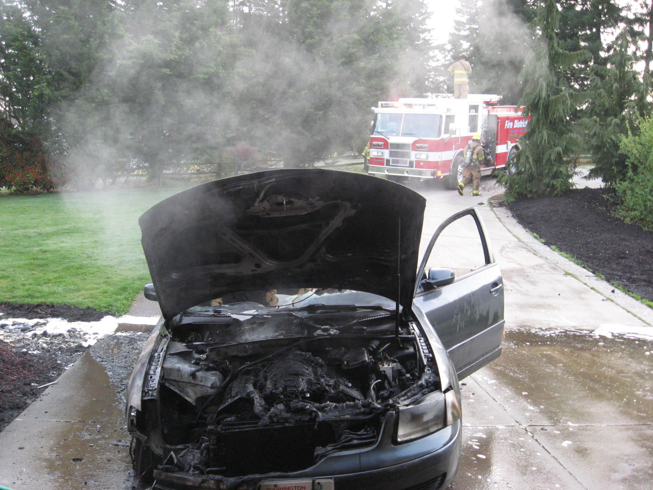 Firefighters with Clark County Fire District 3 doused a car fire in Brush Prairie Tuesday morning.