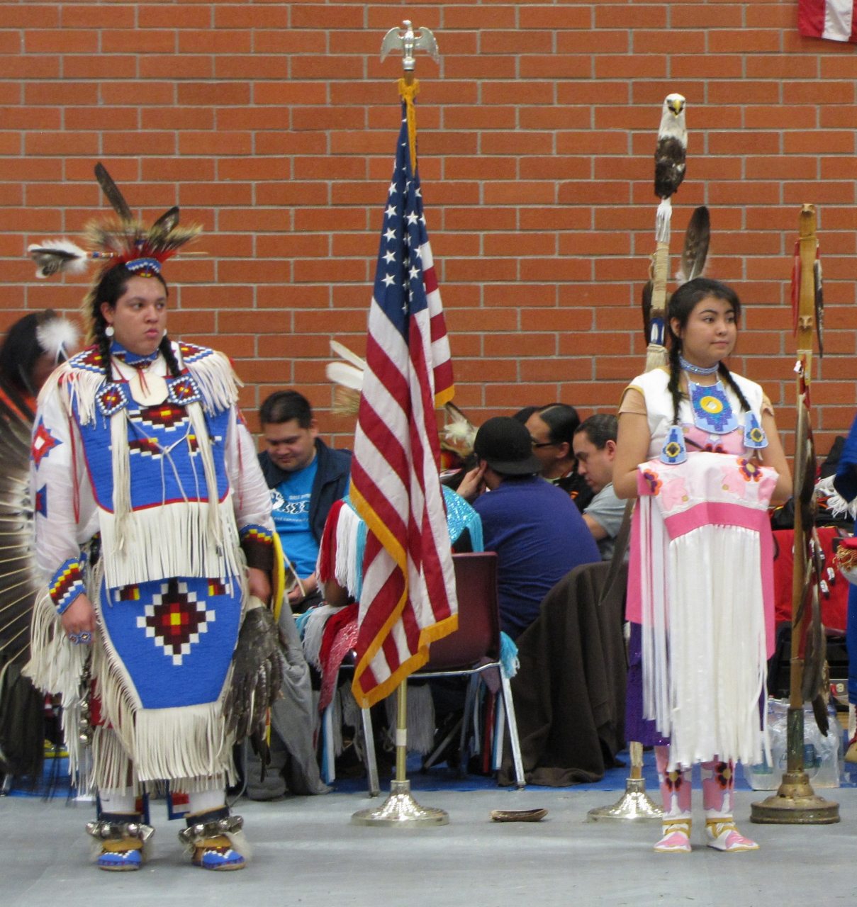 Orchards: Koda Robinson, Head Man Dancer and Alvia Begay, Head Woman Dancer, perform at the Native American Education Program traditional pow-wow at Covington Middle School on March 3.