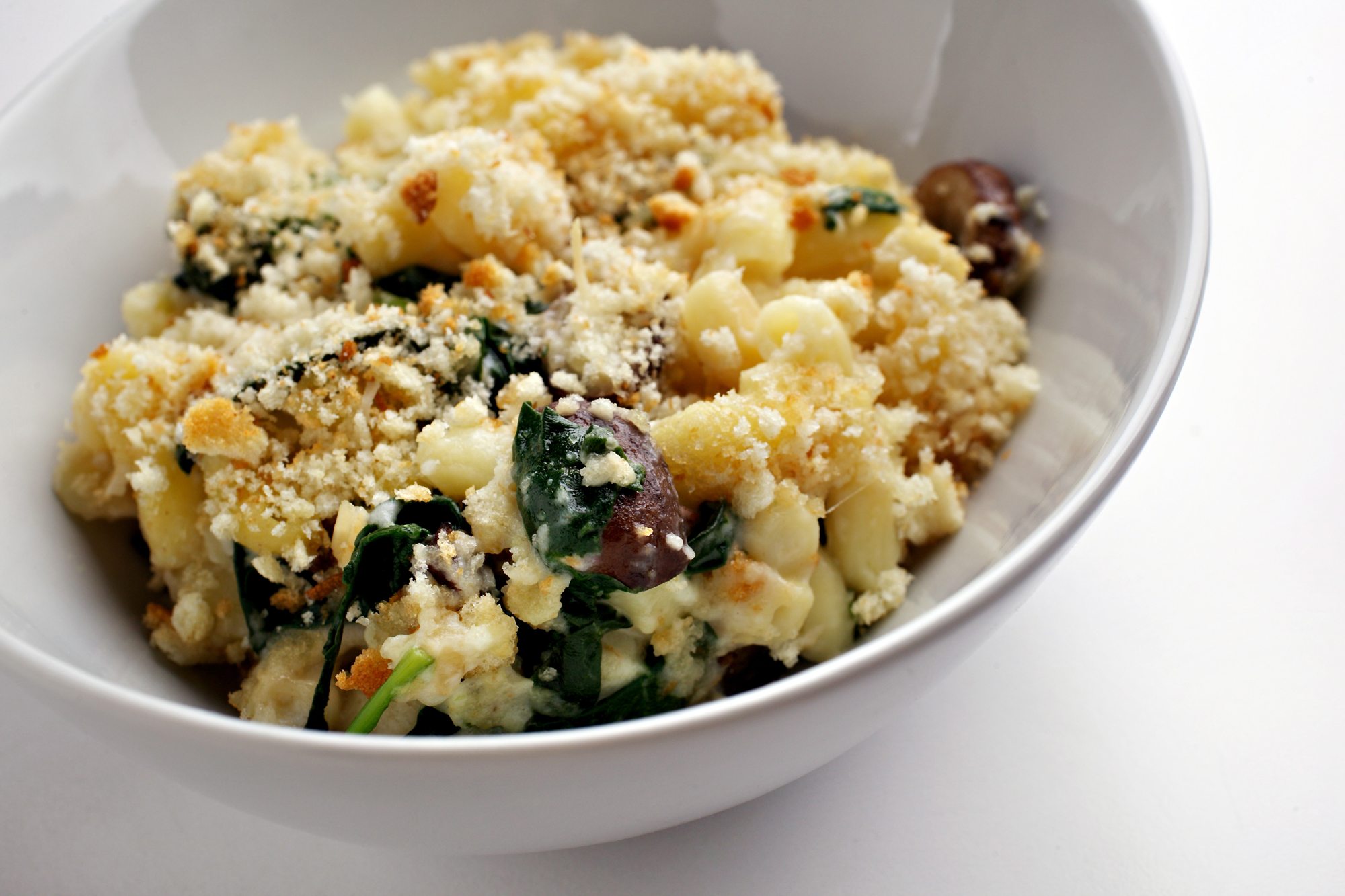 Mushrooms and spinach add nutrition and flavor to a basic mac and cheese.