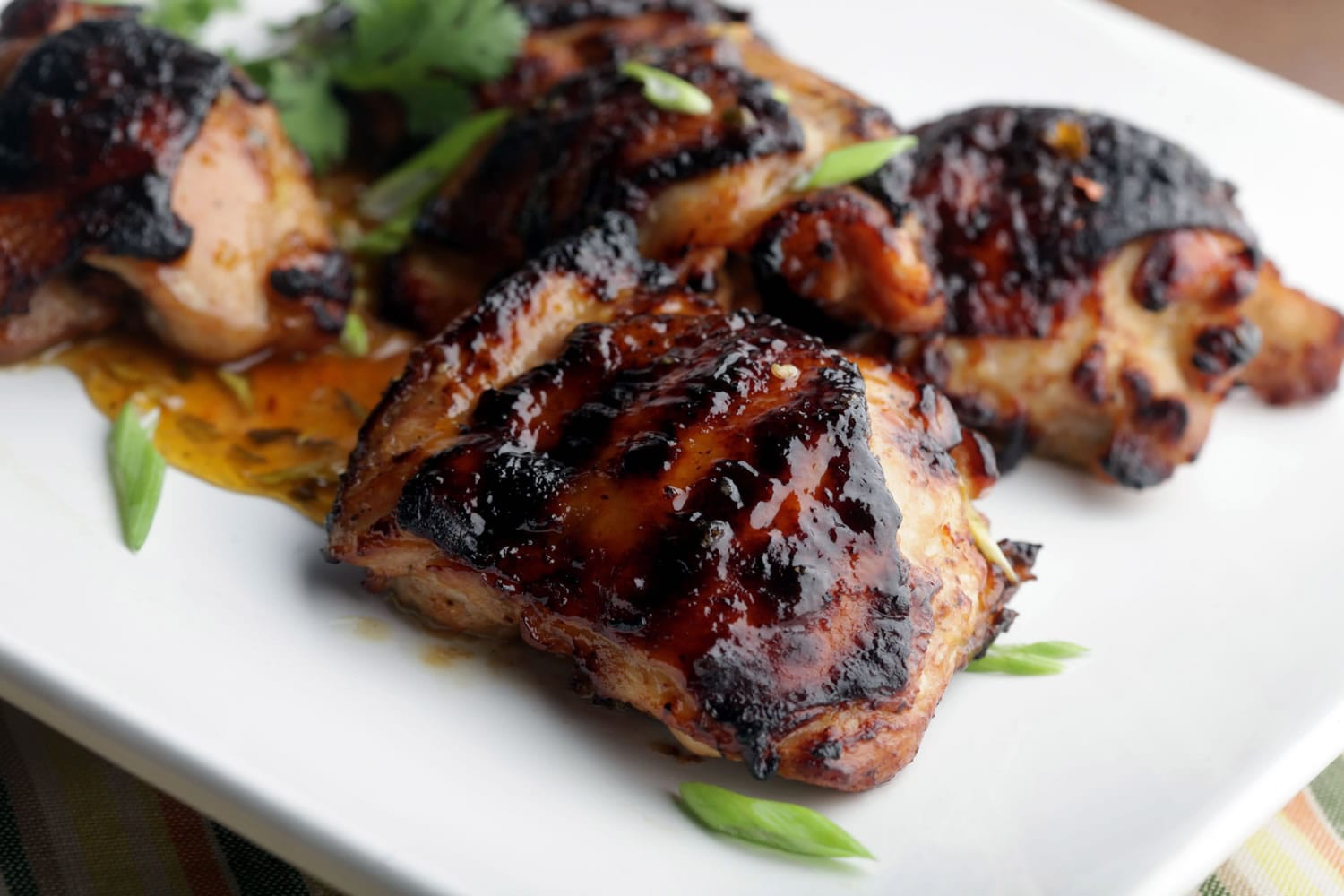 Chicken Thighs with Spicy Apricot Glaze are grilled to perfection.