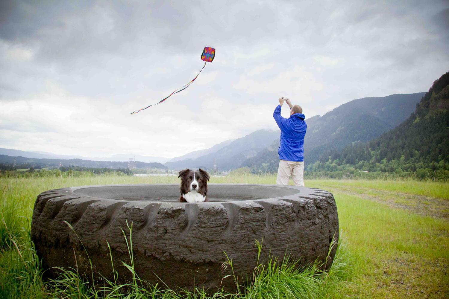 Kirsten Muskat, founder and president of the Camas Camera Club, took this &quot;Family Moment&quot; photo of her husband Richard Kurczak and their border collie Elmo, on Strawberry Island in the Columbia River Gorge, in May 2011. They moved from Tanzania to Camas in 2007. &quot;I looked at this scene before me, and everything had just come together,&quot; Muskat said. &quot;I could feel this image before I took it.