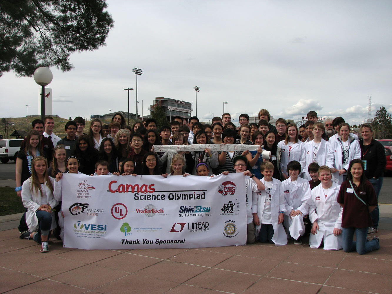 The Camas High School Science Olympiad Team celebrates after winning its third consecutive state championship. The event also included teams from Liberty and Skyridge middle schools, pictured here.
