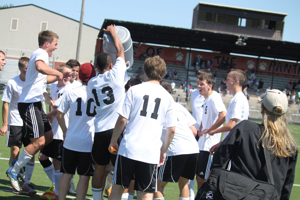 The Washougal boys soccer players celebrate their first trip to the 2A state championship tournament since 2001.