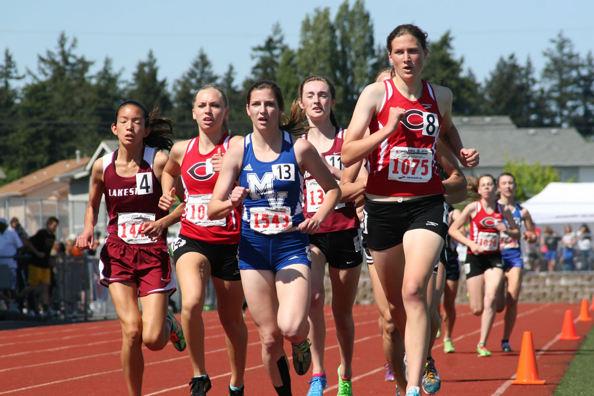 Camas runners Austen Reiter (left) and Camille Parsons (right) feed off each other in the 3A girls 1,600-meter state championship race Saturday, at Mt.