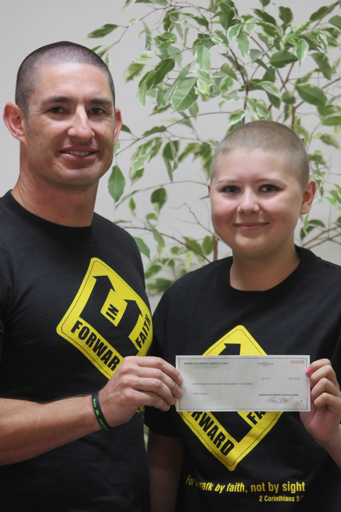 Meadow Glade: Josh MacLachlan, Meadow Glade Adventist Academy Elementary School physical education teacher, helped raise $1,300 for Ashley Rogers, who was diagnosed with leukemia.