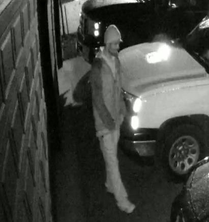 The Battle Ground Police Department is asking for help identifying this man, shown here in a still taken from surveillance video, who is thought have been involved in about a dozen car prowls early morning Jan. 16 in the Crystal Springs neighborhood.