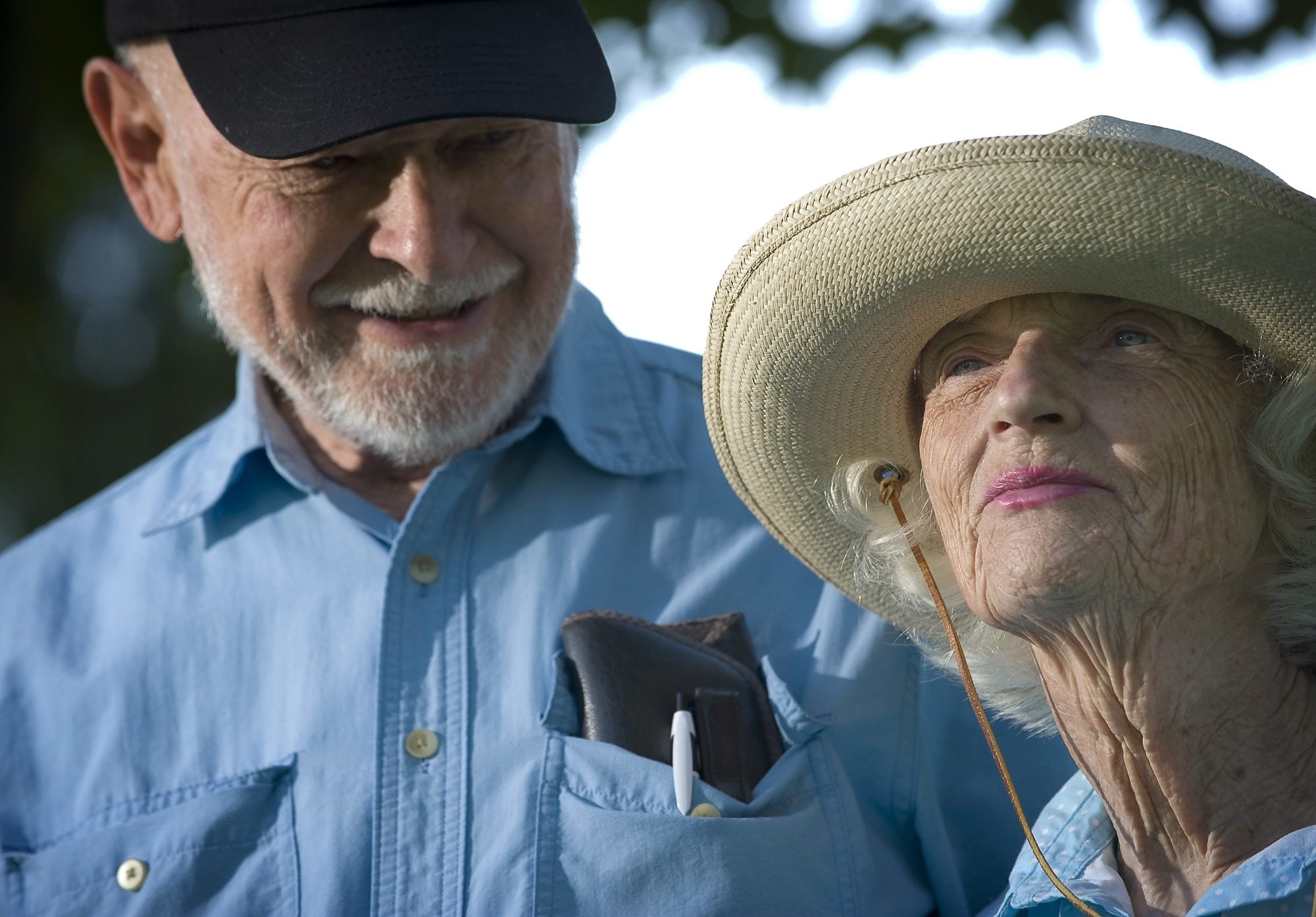 Virg Birdsall, left, admires his wife, Jean, right, before heading off on their daily stroll through Vancouver's H.B. Fuller Park Sept. 9.