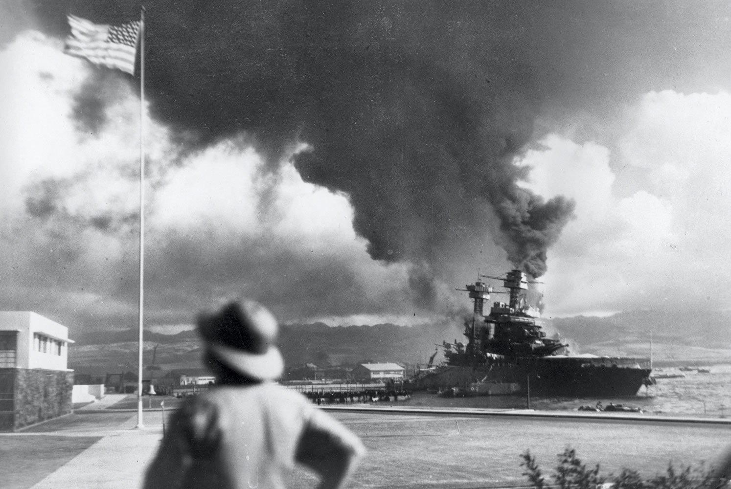 American ships burn during the Japanese attack on Pearl Harbor, Hawaii, on Dec.