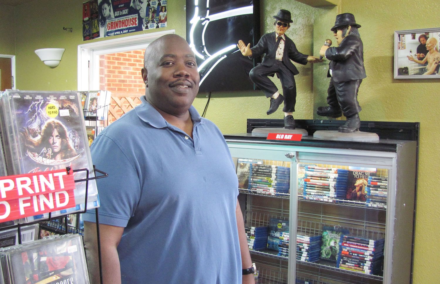 Darcy Hall buys, sells and trades a variety of DVDs, Blu-rays and video games. He recently relocated Disc E. Business, from Portland to downtown Washougal. &quot;The people in this town are awesome,&quot; Hall said.