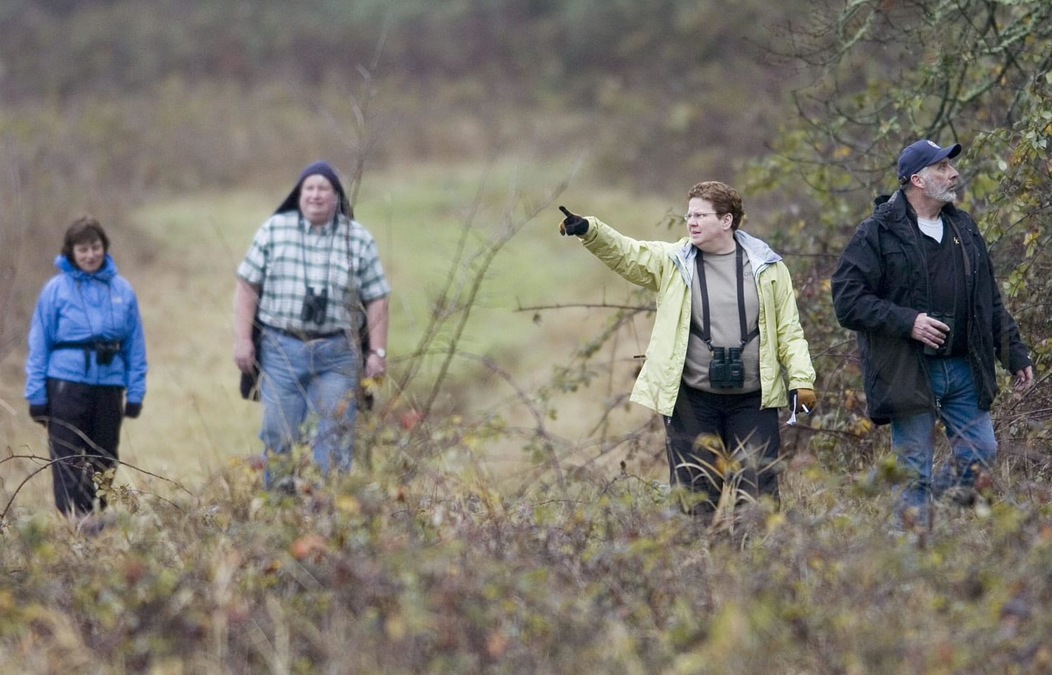 Birders look for feathered friends at the Ridgefield National Wildlife Refuge.
