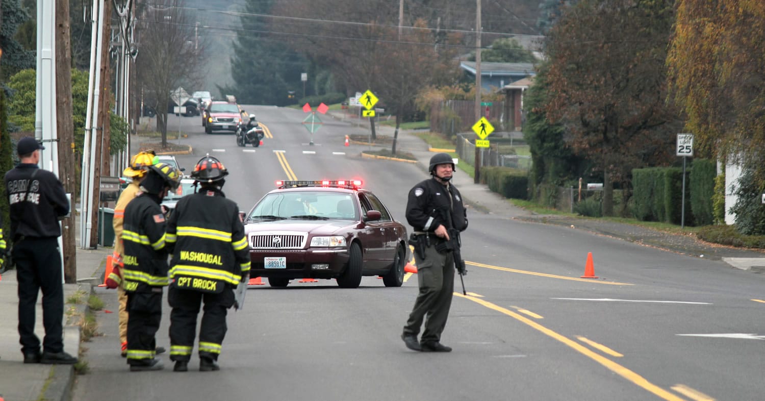 Police closed a four-block area in Washougal Wednesday morning as they responded to reports of shots fired and a house on fire. All businesses and residences within a four-block area between 32nd and 34th Streets, and between Evergreen Way and Webster Lane were evacuated.