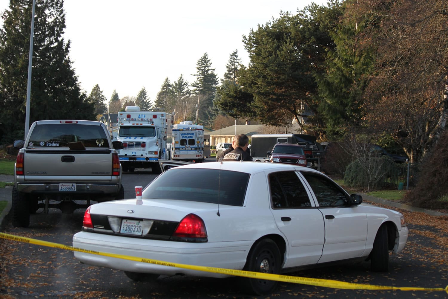 On Thursday, more than 20 investigators were at the scene of Wednesday's shooting and house fire on F Place in Washougal.
