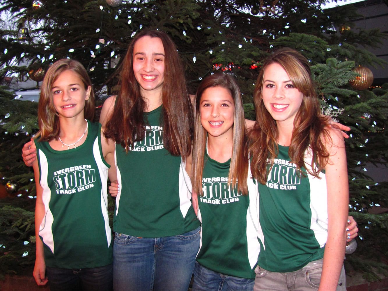 Camas runners Emily Wilson, Alexa Jones, Maddie Woodson and Alissa Pudlitzke (left to right) helped lead the Evergreen Storm to fifth place at the Junior Olympic Cross Country Championships Dec. 10, at Myrtle Beach.