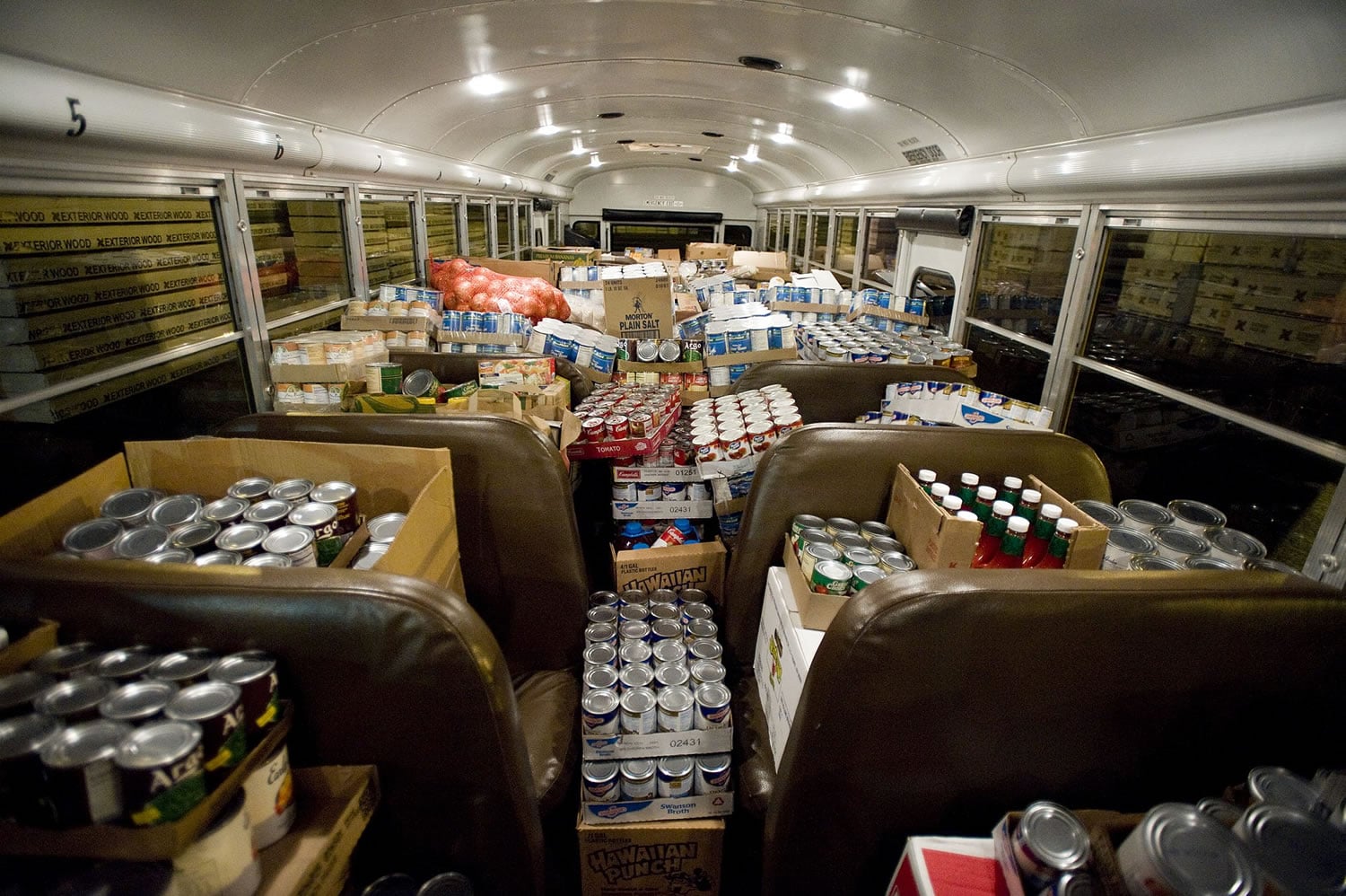 A bus from Camas High School filled with food is weighed during the Stuff the Bus food drive ceremony at Exterior Wood in Washougal, Friday, December 10, 2010.