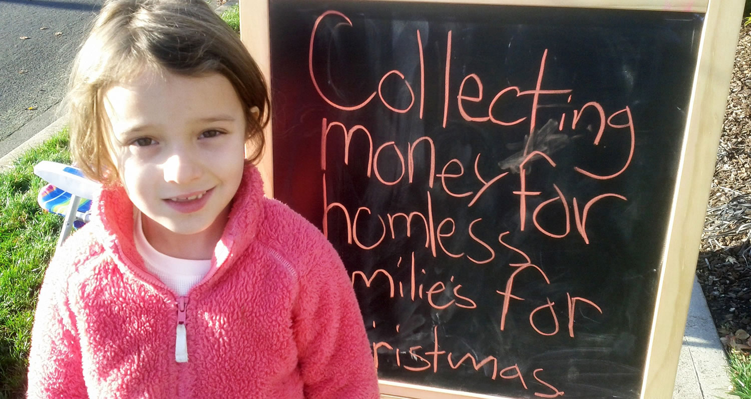 Lilly Drasin, 7, spent the afternoon of Sunday, Dec. 4, collecting money for local homeless families. By the end of the day, she had raised $52.