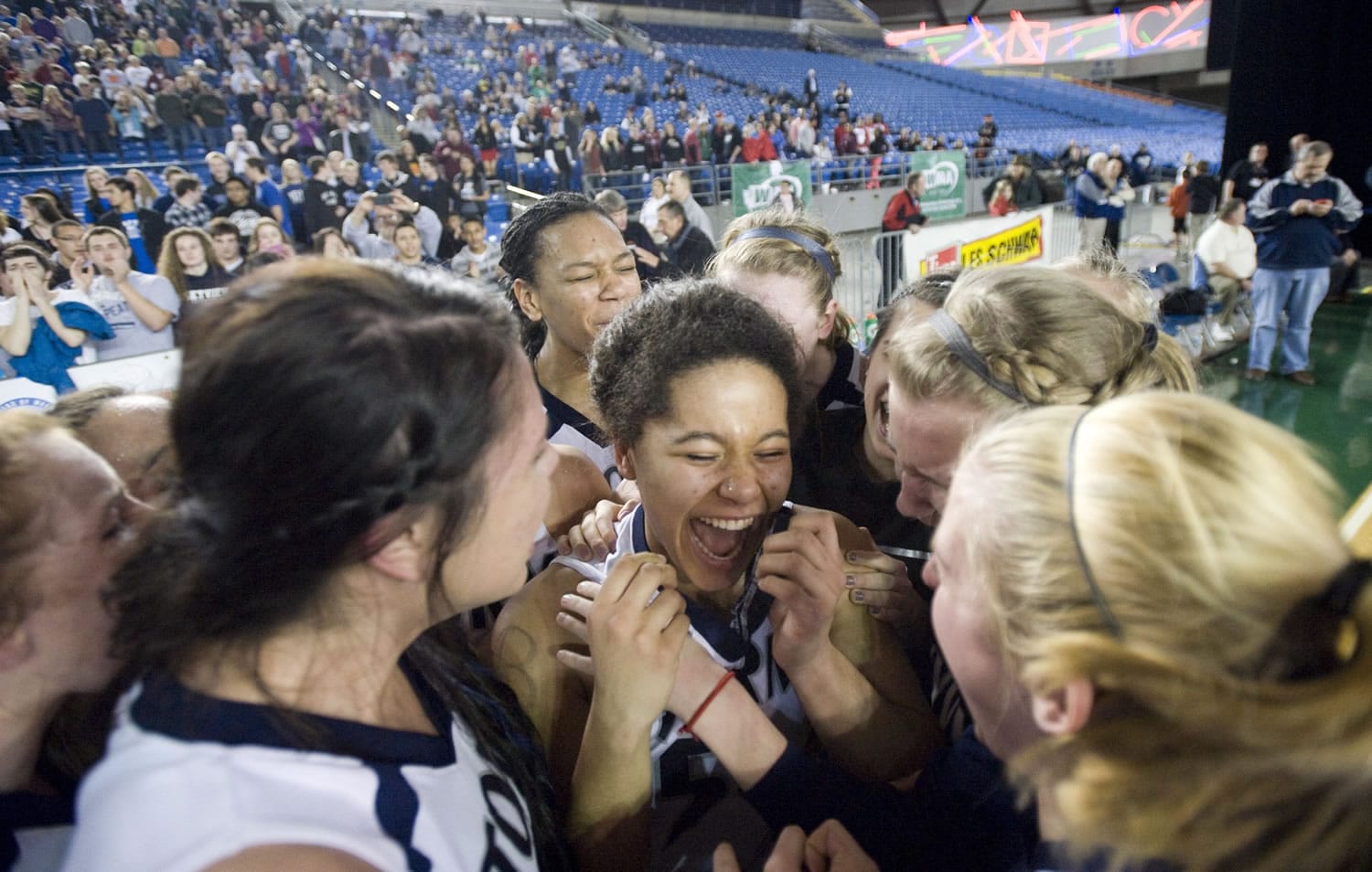 The Skyview girls celebrate after winning the 4A Girls State Basketball Tournament in Tacoma, Saturday, March 3, 2012 Skyview beat Central Valley 46-43.