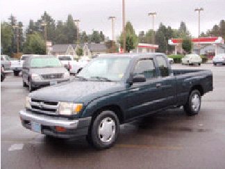 Portland police are looking for a dark-green Toyota Tacoma pickup similar to the one in this photo.