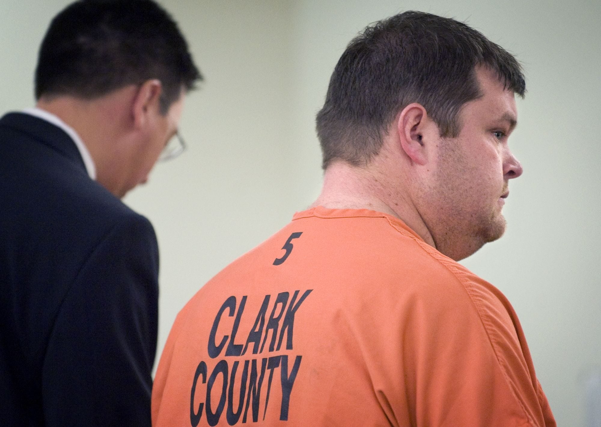The &quot;River Rat&quot; robber's getaway driver, Travis Lee Oles, was sentenced Thursday in Clark County Superior Court to 18 years in prison.