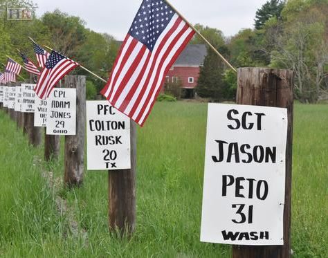 A group in Holliston, Mass., recently put up Memorial Day tributes to service members killed in Iraq and Afghanistan since Veterans Day, including Marine Sgt.