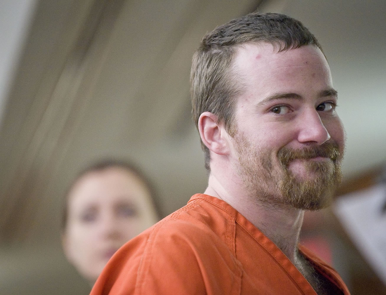 Mathew Michaelson, 28, pictured here at a court hearing in December, was sentenced Friday to seven years in prison in connection to an alleged hatchet attack.