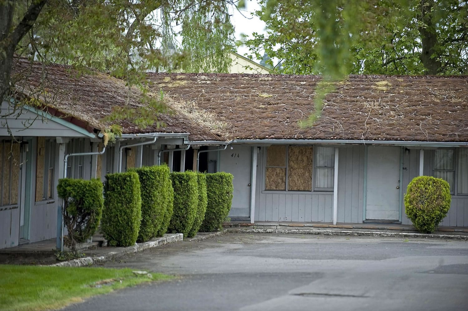Clark County Commissioner Marc Boldt wants the county to pursue condemning and demolishing two boarded-up buildings located along Highway 99 on the Value Motel site. Boldt said the county has asked owner Milton O.