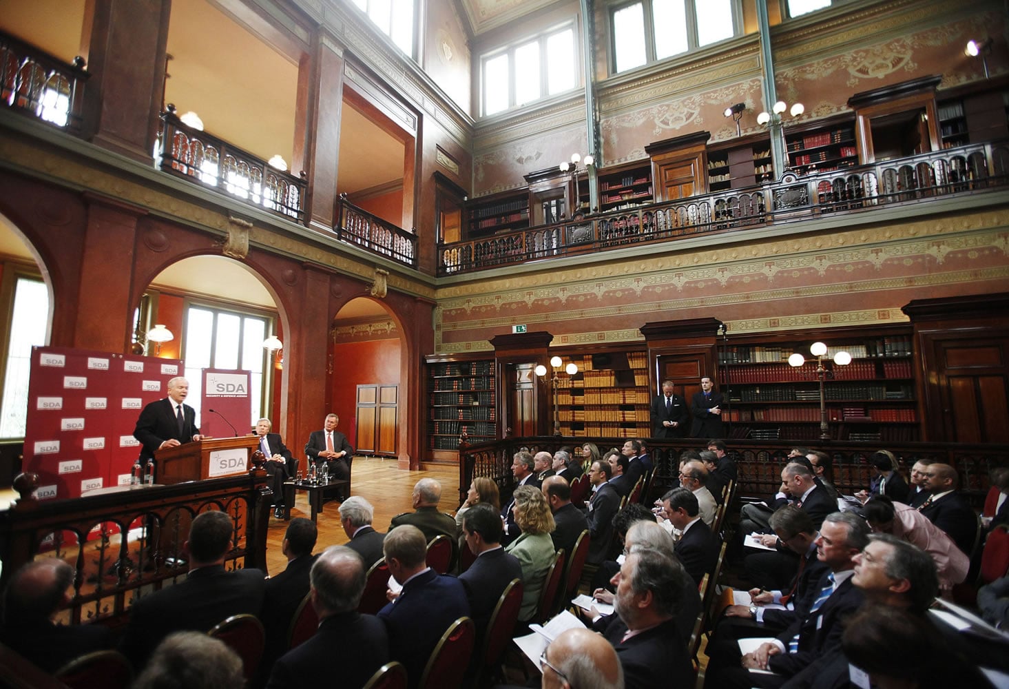 U.S. Defense Secretary Robert Gates speaks during a Security and Defense Agenda event at the Biblioteque Solvay in Brussels on Friday. In his final policy speech as Pentagon chief, Gates questioned the viability of NATO, saying its members' penny-pinching and lack of political will could hasten the end of U.S.
