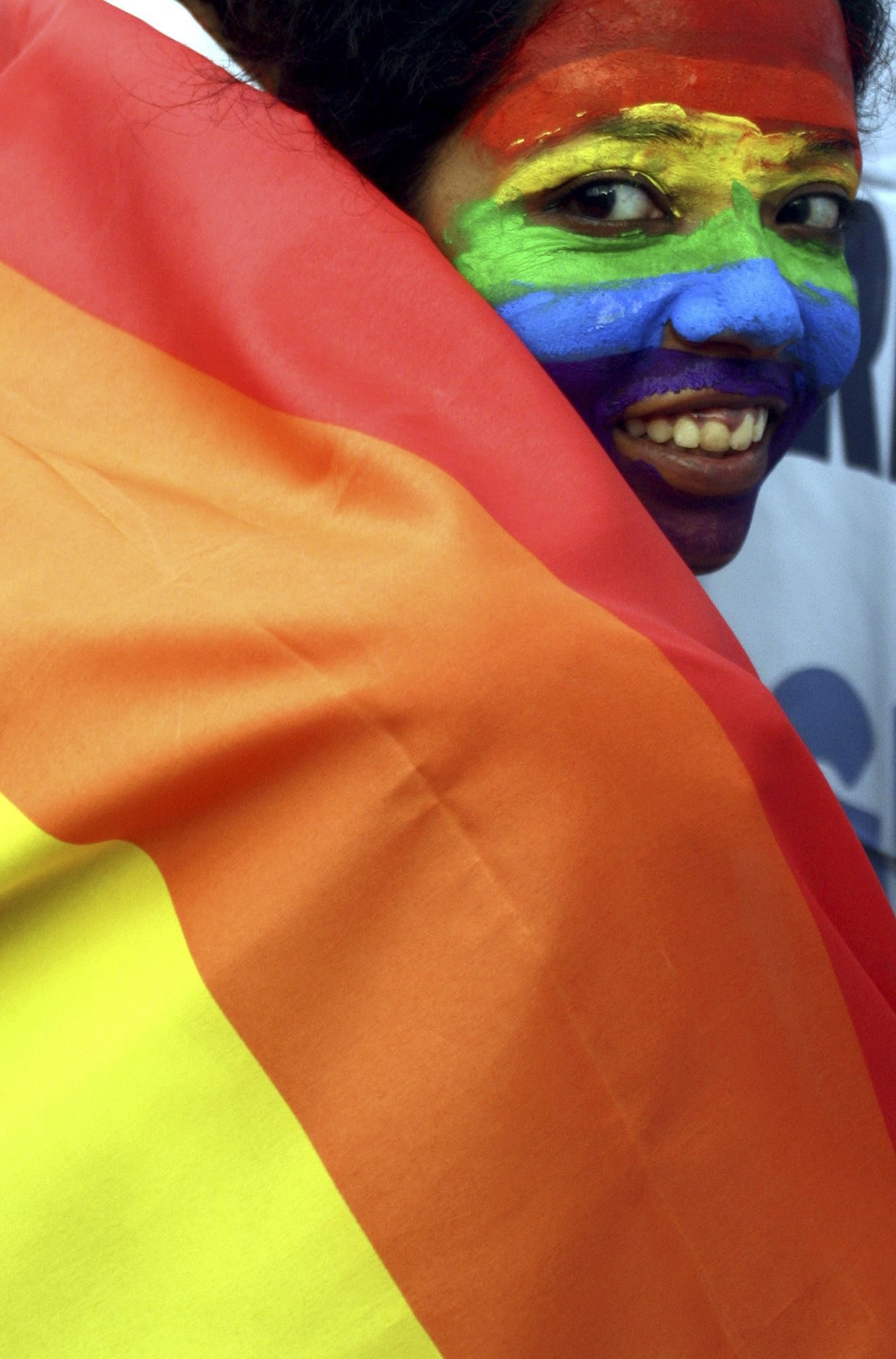In this July 2, 2009 file photo, a gay rights activist in Calcutta, India, participates in a rally celebrating the groundbreaking ruling by the Delhi High Court decriminalizing homosexuality.