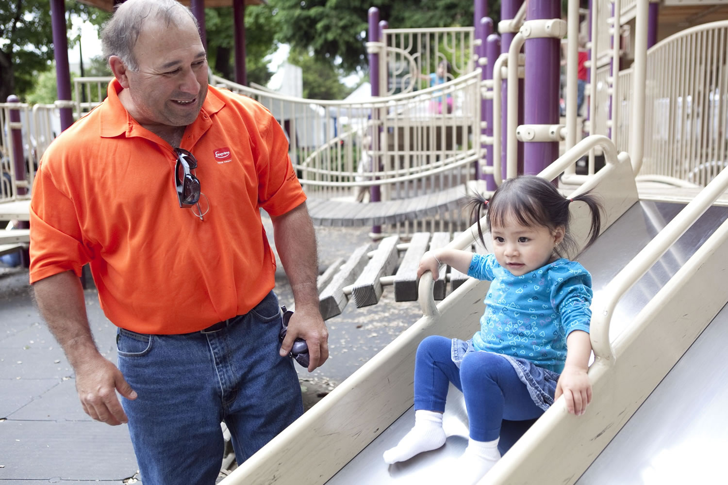 Abraham Escobedo, 53, of Hazel Dell spends time with his 1 1/2 -year-old daughter, Gabriella, at Esther Short Park on Father's Day.