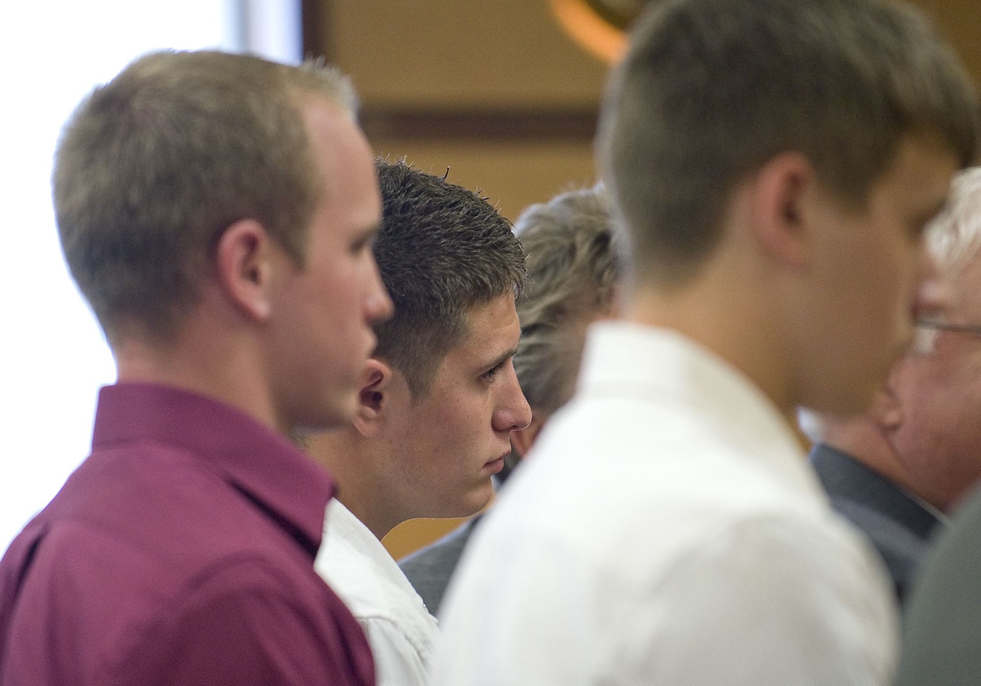 North Clark County teenagers from left, Riley Munger, Mitchell Kangas and Jaren Koistinen make an appearance in court earlier this year.