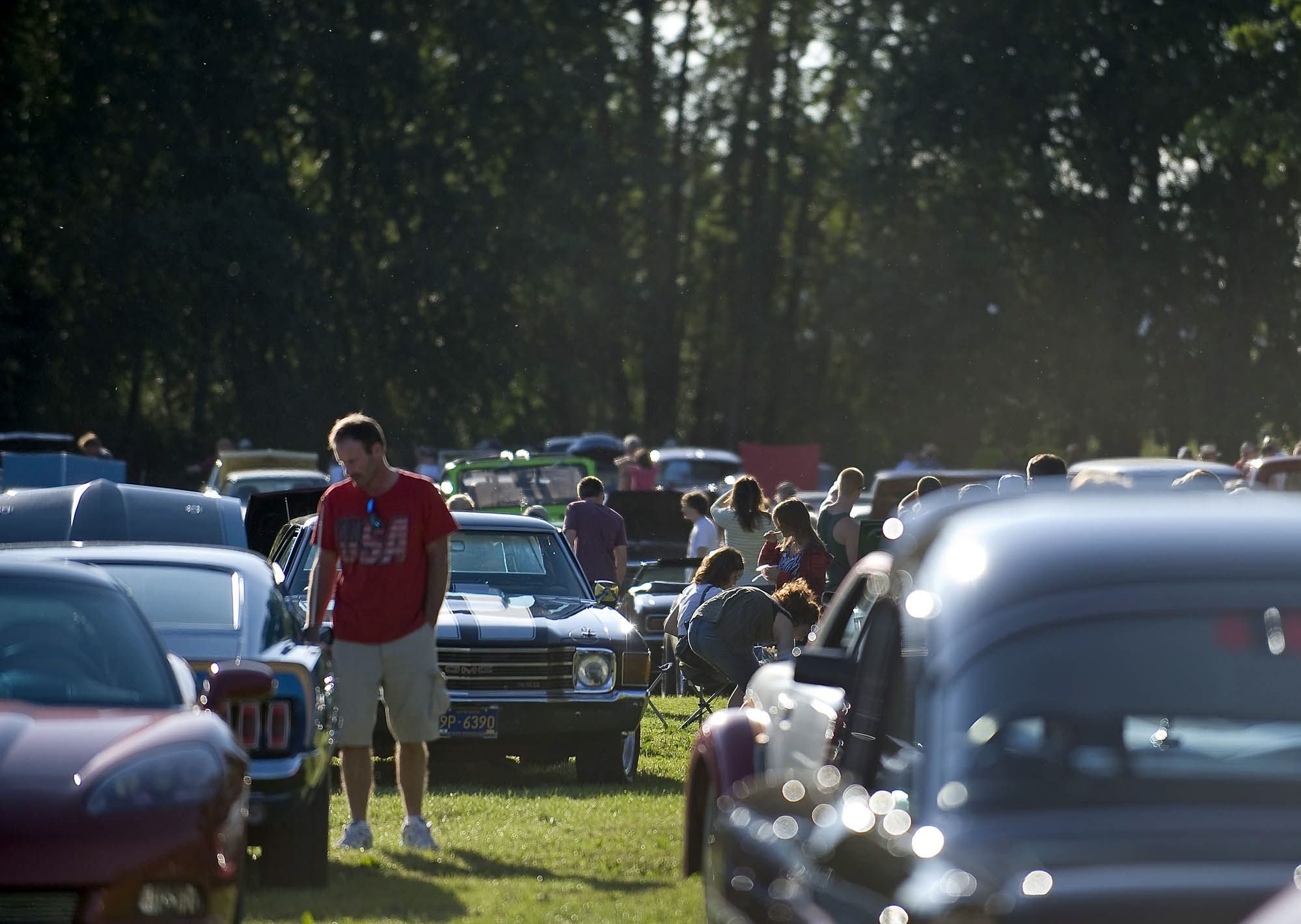 A crowd admires hundreds of vintage and contemporary vehicles Wednesday at the Beaches Summertime Cruisin' at Portland International Raceway.