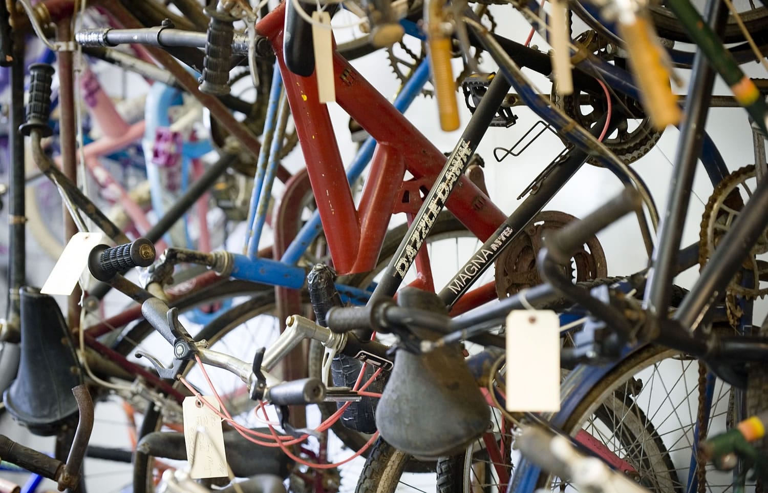 Used bikes await repair and cleanup Monday at Open House Ministries homeless shelter's new bike shop.