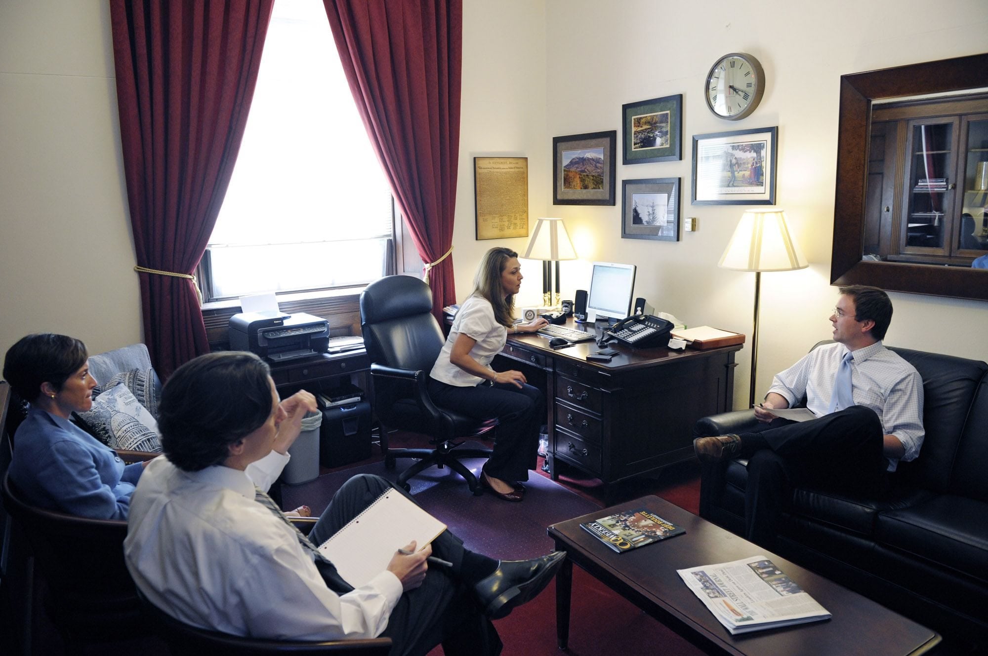 Rep. Jaime Herrera Beutler, R-Camas, center, meets with her legislative and communications staff Monday in her Capitol Hill office in Washington, D.C.
