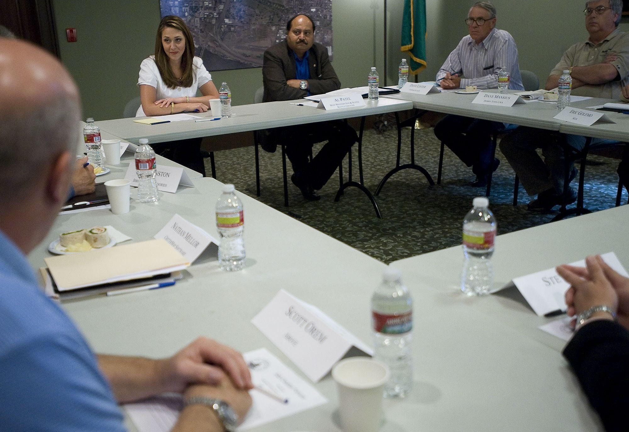 Rep. Jaime Herrera Beutler, left, invited a dozen Southwest Washington business leaders to talk about their concerns at Vancouver's O.O.